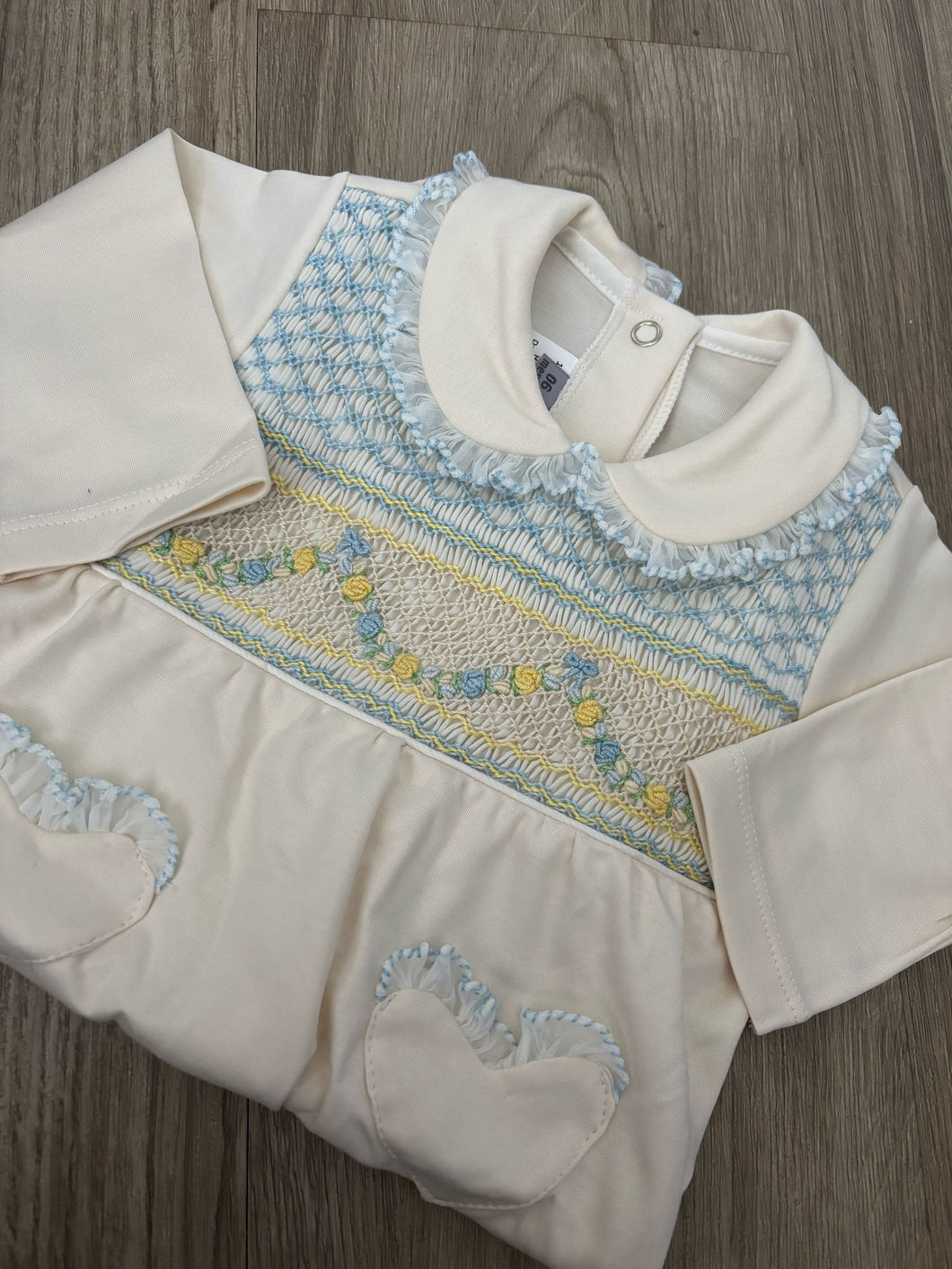 Cream garland babygrow