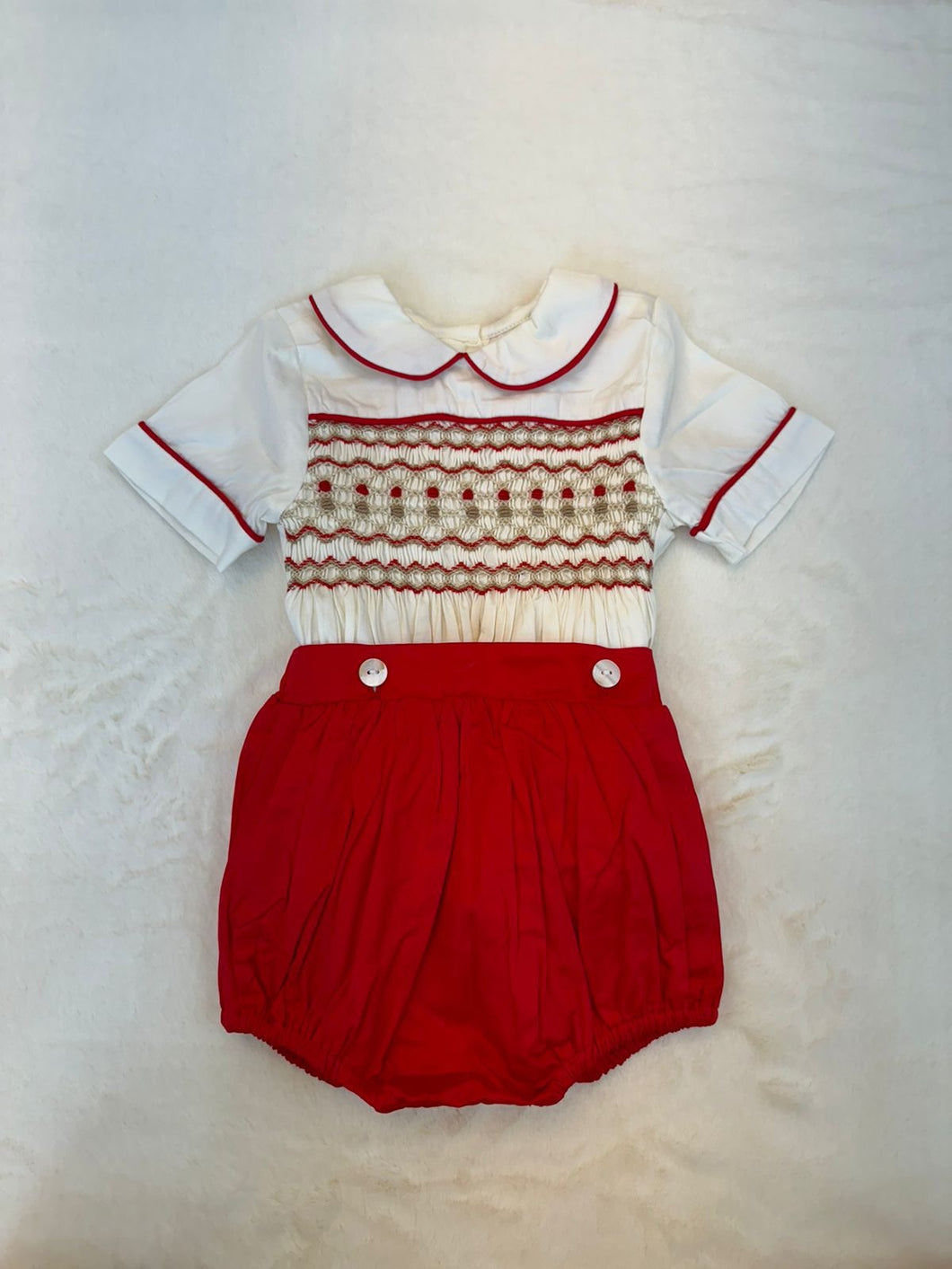 Red and cream/tan smock suit